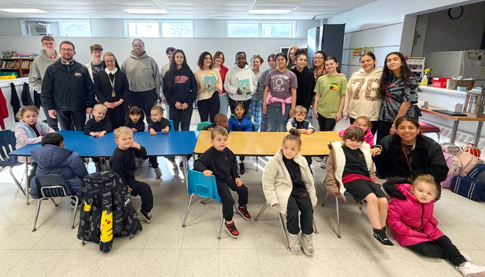 Rockaway parish presents book on vocations to Divine Mercy Academy